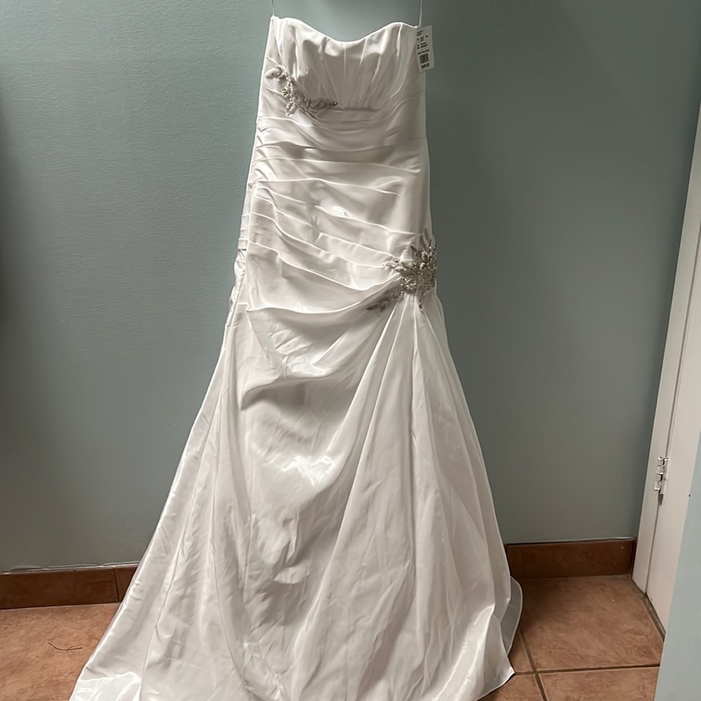 Never been worn brand new tags on Wedding dress